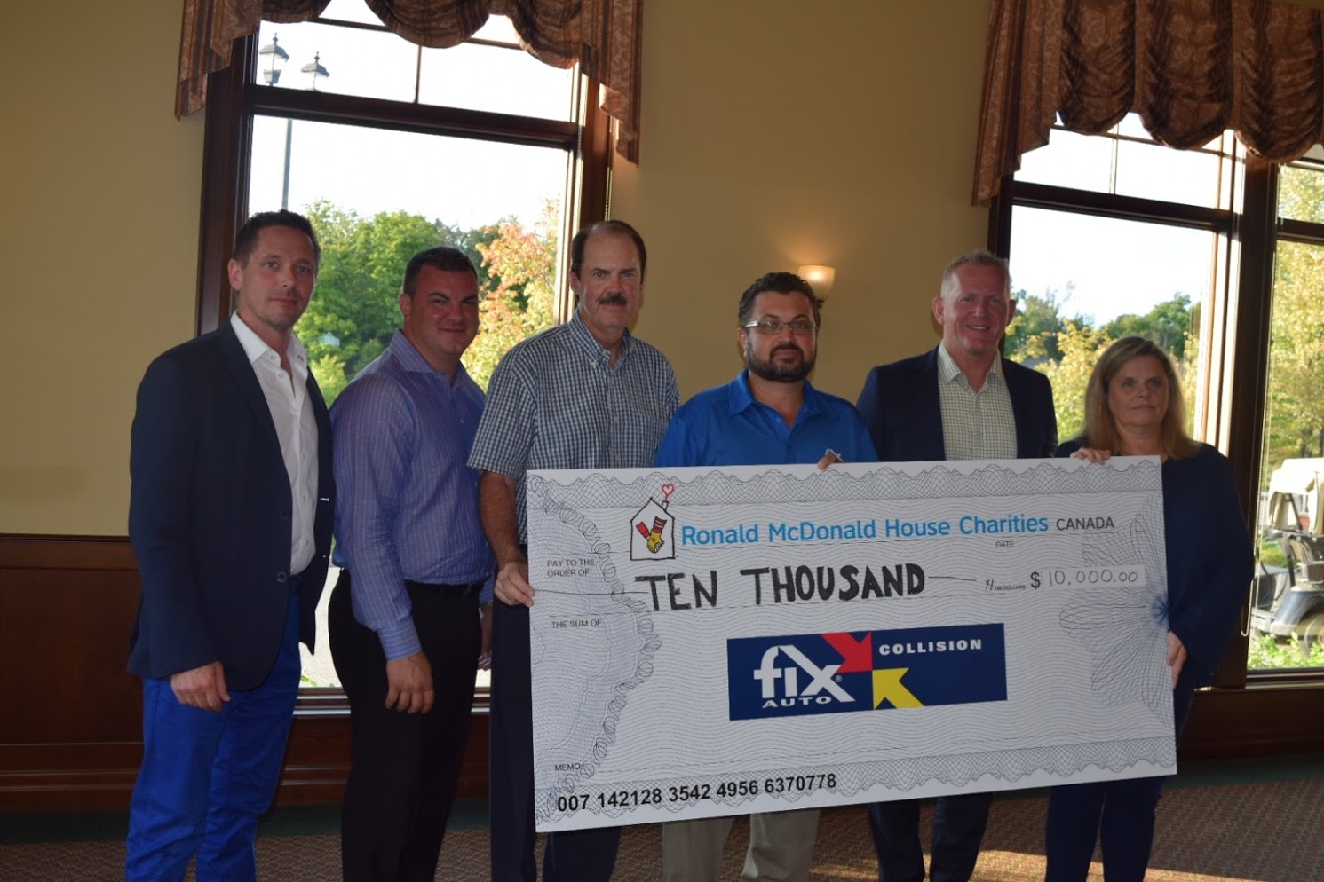 Fix Auto Canada Ten Thousand Dollar Cheque Presentation.