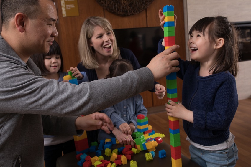 Family playing lego
